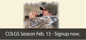 image: guy using a duck call