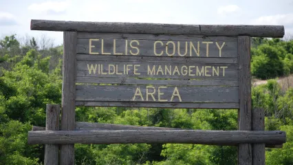 Wooden Ellis County WMA sign, photo by Whitney Jenkins