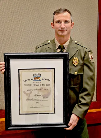 Oklahoma's Wildlife Law Enforcement Officer of the Year, Game Warden Jared Cramer.
