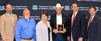 Gathered for the 2021 ODWC Landowner Conservationist of the Year Award presentation are, from left, ODWC Director J.D. Strong, Private Lands Biologist Brett Cooper, landowners Phyllis and RC Brown, ODWC Wildlife Chief Bill Dinkines, and Wildlife Assistant Chief Russ Horton. (Don P. Brown/ODWC)