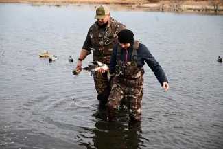 Duck hunters in the water, photo by Sarah Southerland