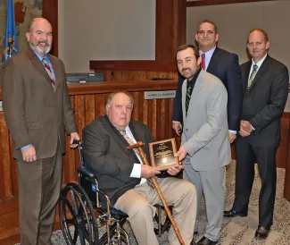 Honoring the 2022 Landowner of the Year are, from left, ODWC Director J.D. Strong, honoree Herman Jones, ODWC Wildlife Technician Nathaniel Kester, ODWC Wildlife Chief Bill Dinkines, and ODWC Private Lands Supervisor Josh Richardson. 