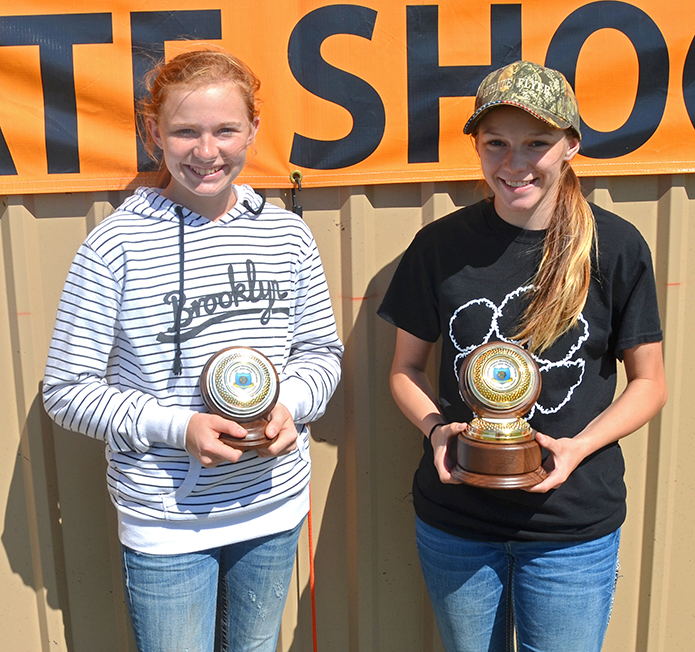 Top junior female shooters are Casady Sublett of Hyrdo-Eakley, runner-up; and Shay Skaggs of Pond Creek-Hunter, champion junior female shooter. Not pictured: Brooklyn Higgenbottom of Boswell, second runner-up.