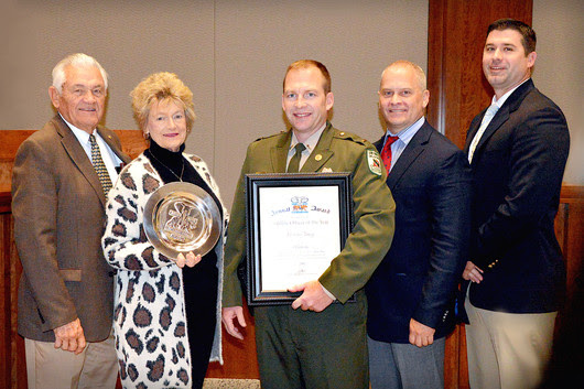 Gathered to present the Shikar-Safari Club International Wildlife Officer of the Year Award are, from left, Wildlife Commissioner Bill Brewster and Suzie Brewster of Shikar-SCI; honoree Game Warden Lt. Casey Young; Col. Nathan Erdman, Law Enforcement Chief; and Lt. Col. Wade Farrar, Law Enforcement Assistant Chief. (Don P. Brown/ODWC)