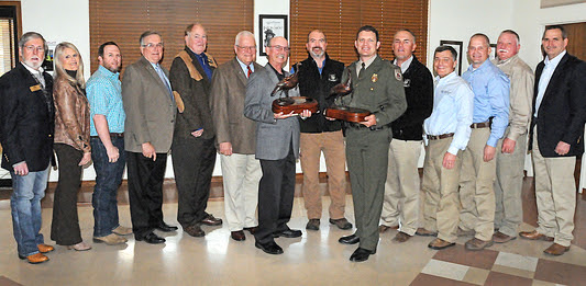 NWTF officials honor two Wildlife Department award winners.