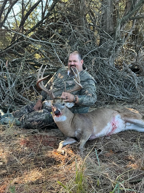 Robert Bosse with his typical whitetail buck.