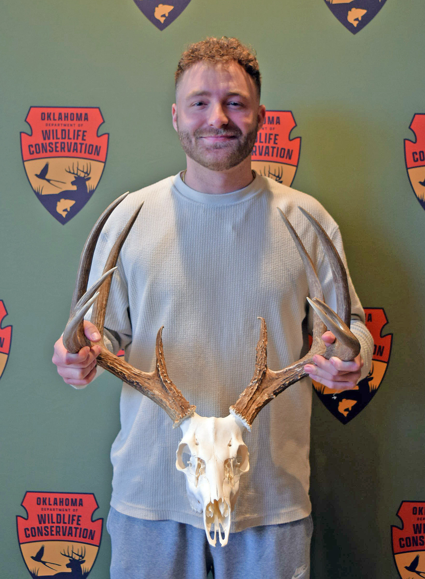 tyler smith holding deer rack