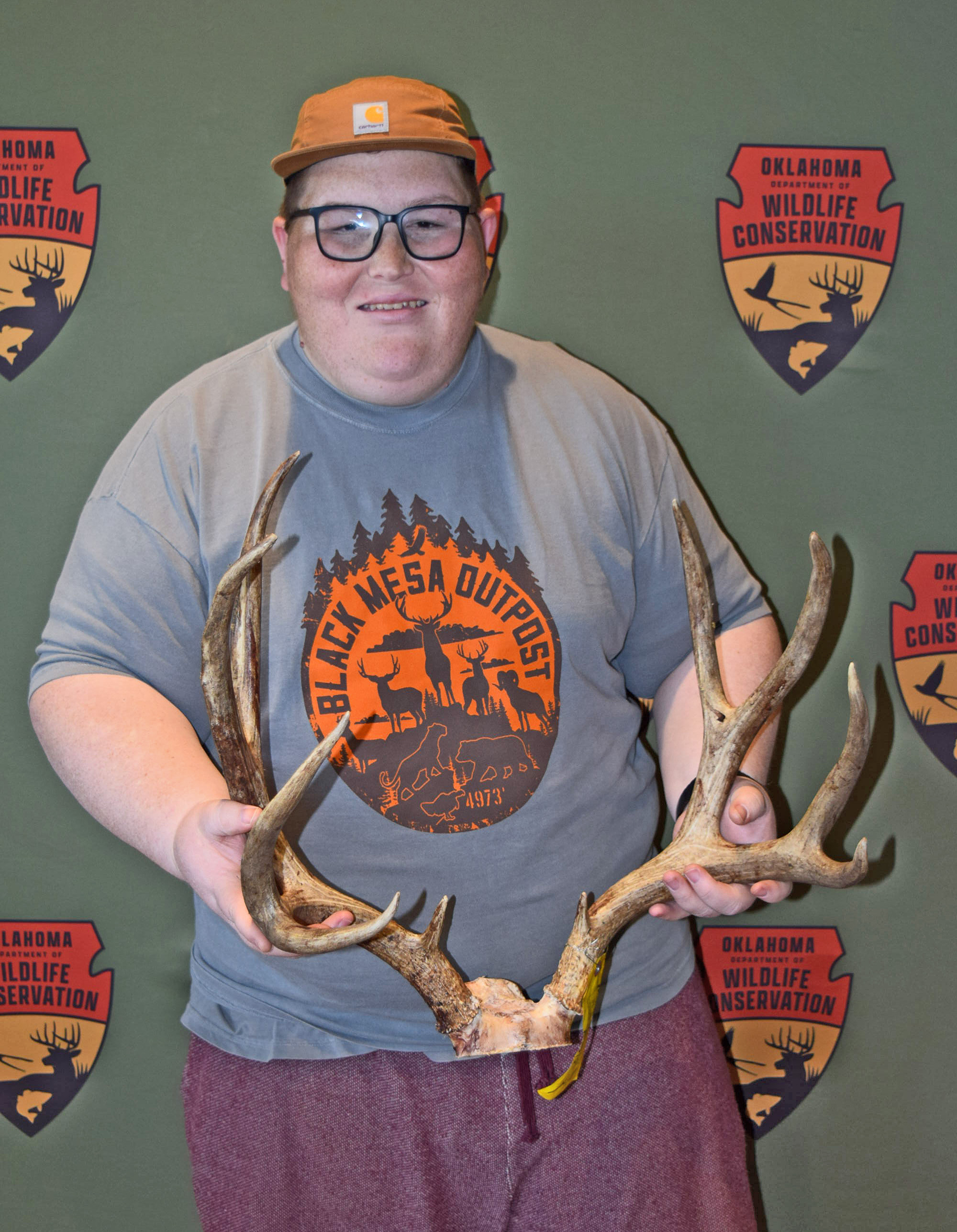 matt engel holding a deer rack