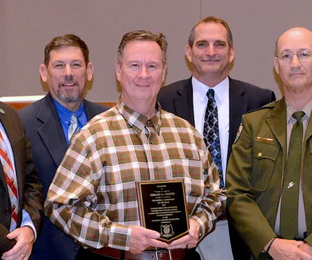 2019 Landowner Conservationist of the Year Award: J.D. Strong, Director-ODWC; Russ Horton, Research Supervisor; Gerald Choate, honoree; Bill Dinkines, Assistant Chief-Wildlife; Carlos Gomez, Game Warden; Wade Free, Assistant Director-ODWC.