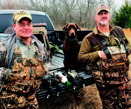 Hunting friends Anthony Mackey, 46, of Noble, and Aaron Milligan, 58, of Norman