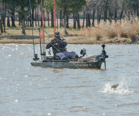 Man fishing from kayak.