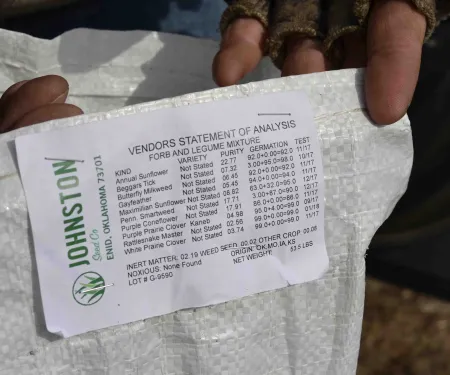 A tag on a bag of seed for flowering plants.