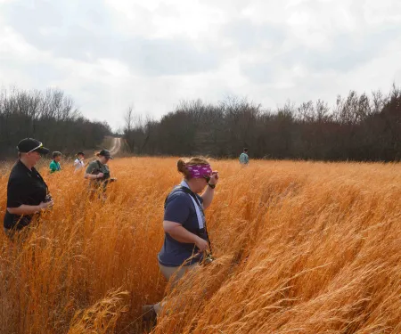 OKC Zoo surveying in field.