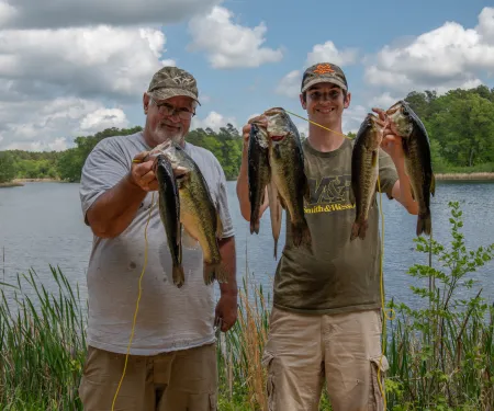 Anglers with largemouth bass.