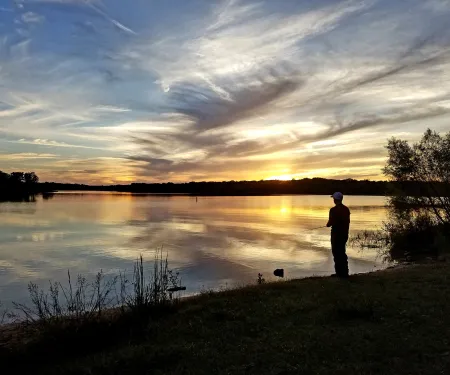 Thunderbird State Park man fishing on bank.  Photo by Ashley Church/RPS 2018