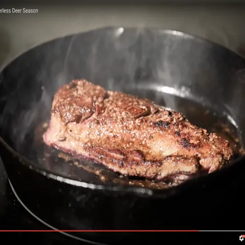 Venison in a pan.