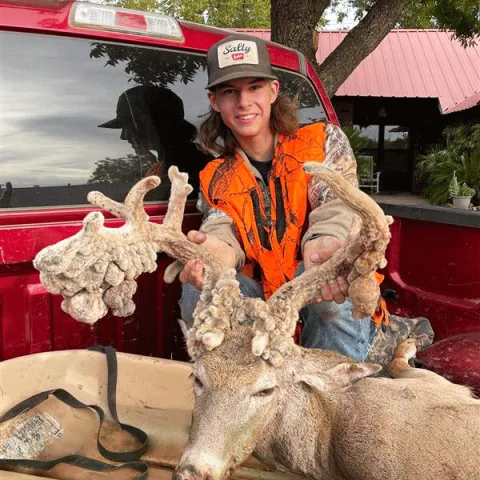 Major Edmonds shows off his Fall 2023 harvested buck with a unique set of antlers.