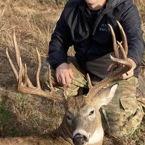 man with buck