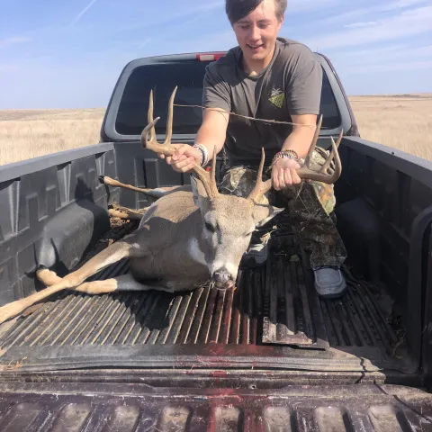young man with buck