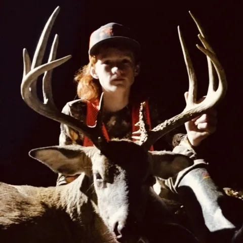 boy with buck