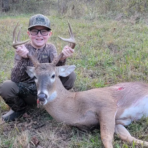 boy with buck