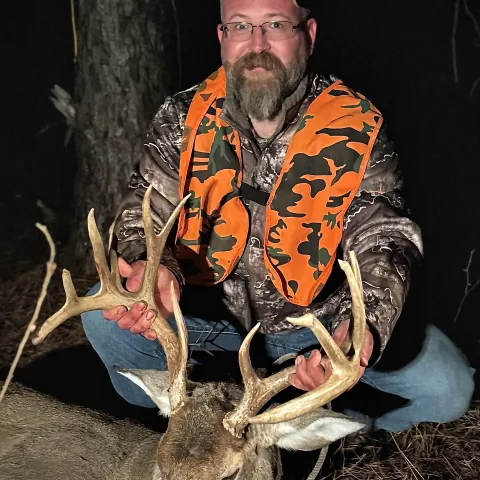 man with buck