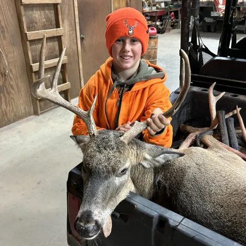 boy with buck
