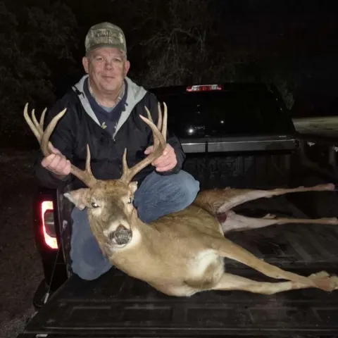 man with buck
