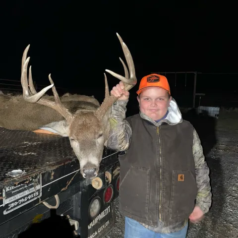 boy with buck