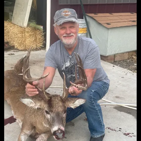 man with buck