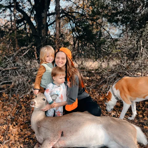 mom and 2 sons with doe