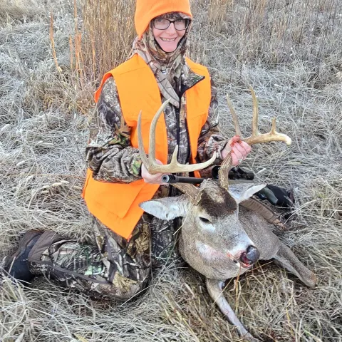 Woman with buck