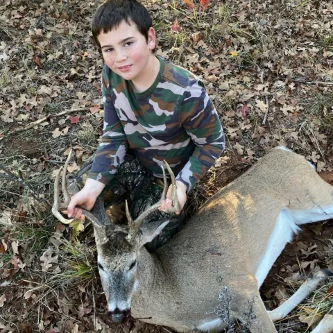 boy with buck