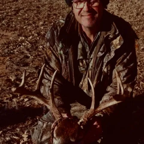 man with buck