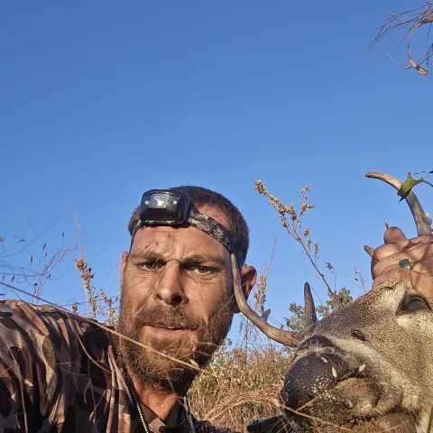 Joseph Lee with his harvested Oklahoma whitetail deer.
