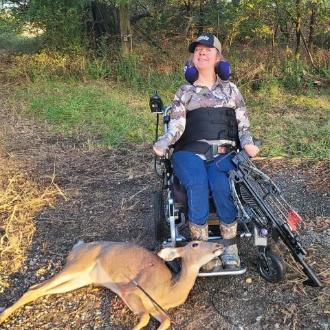 Kenzi Burnside with her harvested Oklahoma White-Tailed Deer