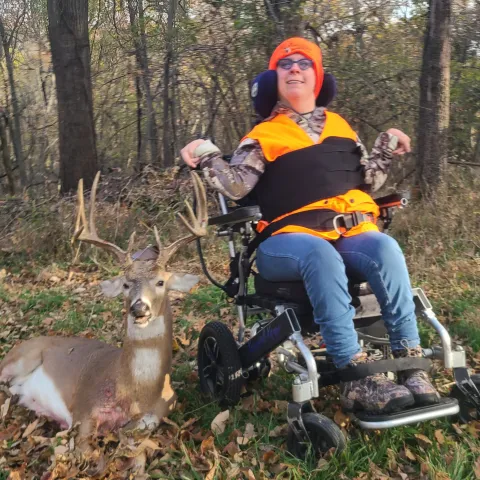 Kenzi Burnside with her harvested Oklahoma White-Tailed Deer