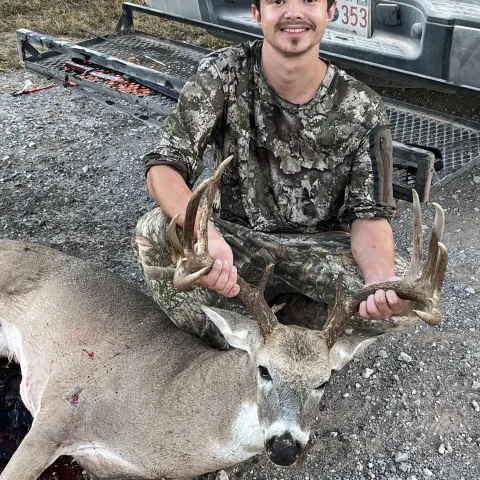 Amadeus Sandifer with his harvested Oklahoma White-Tailed Deer