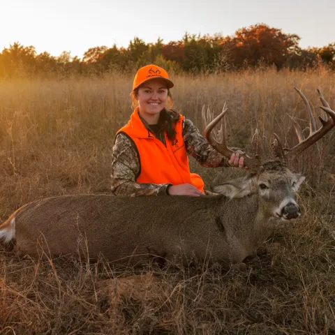 Cassidy A with her harvested Oklahoma White-Tailed Deer