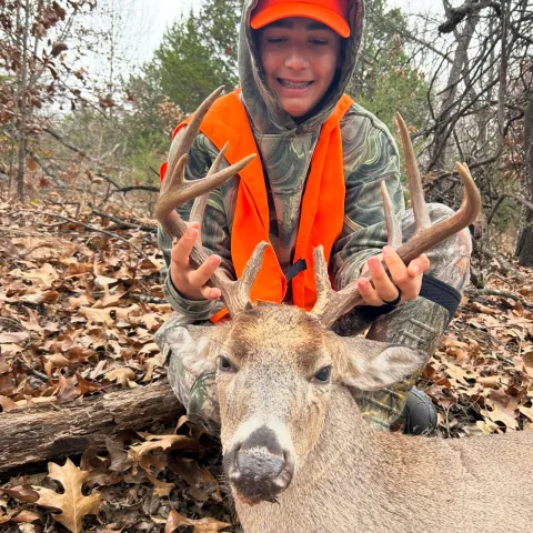 Jonathan Collett with his harvested Oklahoma White-Tailed Deer
