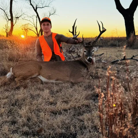 Logan Moss with his harvested Oklahoma White-Tailed Deer