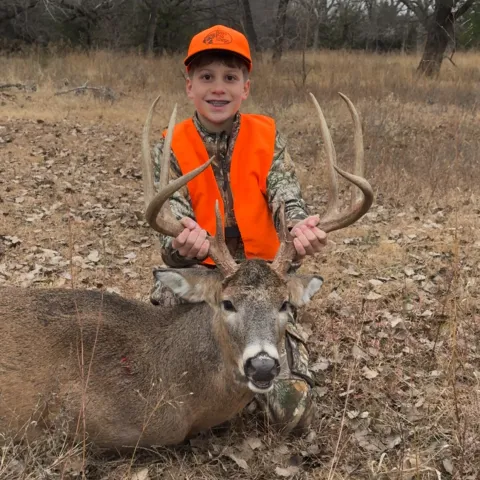 Kashin Kimberly with his harvested Oklahoma White-Tailed Deer