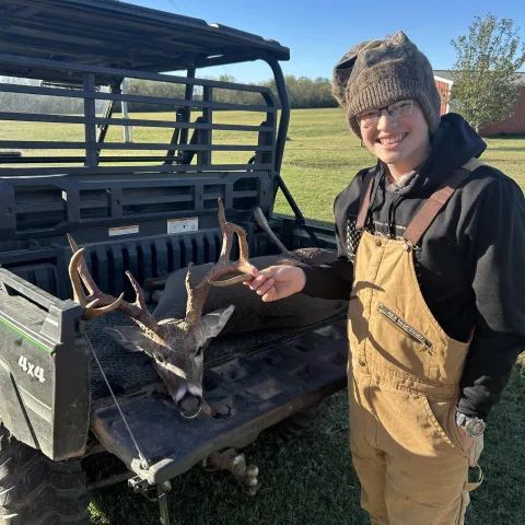 Cale Hudson with his harvested Oklahoma White-Tailed Deer
