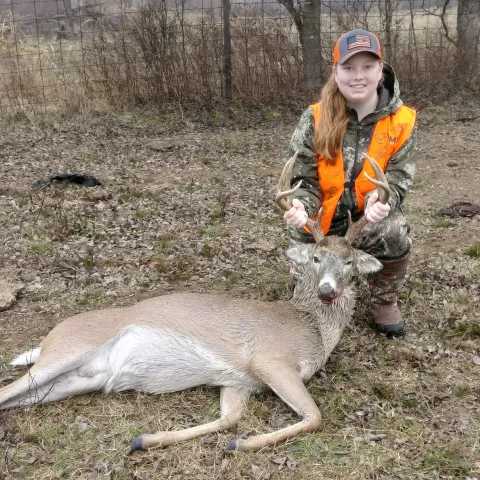 Lauren Schaefer with her harvested Oklahoma White-tailed Deer.