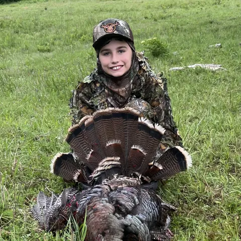 Jase Young with his harvested Oklahoma Wild Turkey