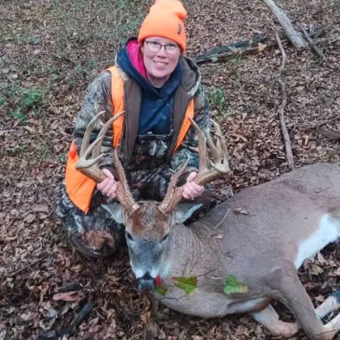Amber Lee with her harvested Oklahoma White-tailed Deer.