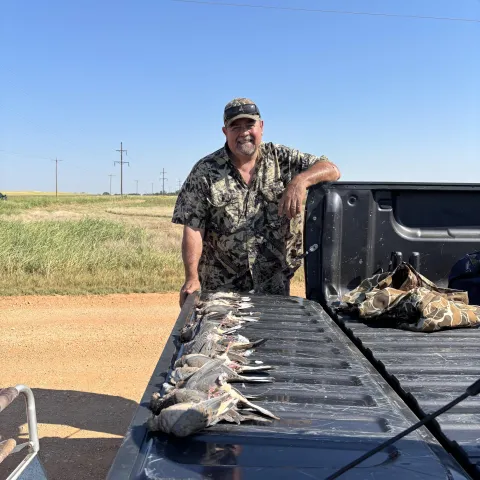 Bill Willis with his harvested Oklahoma Dove.