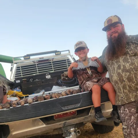 Ashley P with their harvested Oklahoma Dove