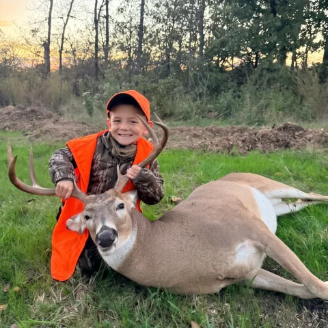 Isaac Barrett with his harvested Oklahoma White-tailed deer.