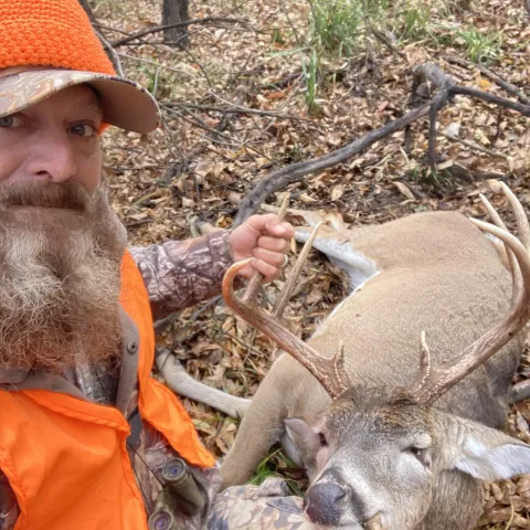 Hunter pictured with harvested deer.